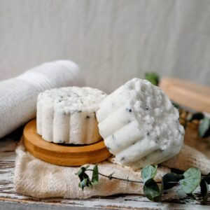 Lavender Bath Bomb dissolving in warm bath water with relaxing aroma